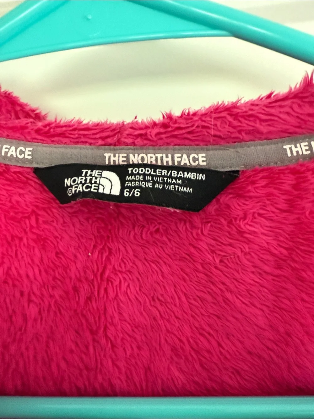 The North Face Girls' Magenta Fleece Hoodie with Gray Shoulder Panels